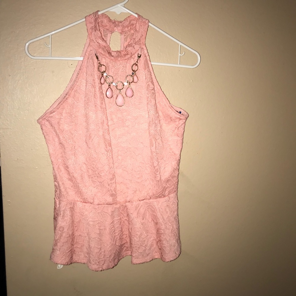 Peplum top with necklace